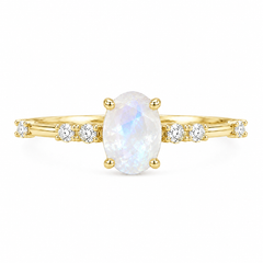Anillo de compromiso fino de oro amarillo de 14k con ópalo azul ovalado y diamantes para mujer