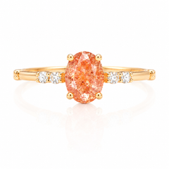 Delicado y elegante anillo de promesa de oro amarillo de 14k con piedra solar de talla ovalada y diamantes para ella