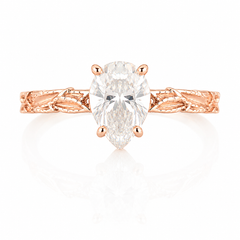 Nature inspired unique 14k rose gold women pear moissanite engagement ring with leaf band