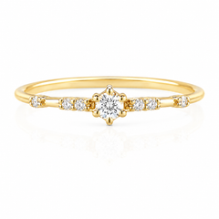 Delicado anillo de promesa de oro amarillo de 14k con diamante para ella