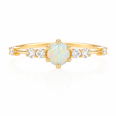 Delicado y elegante anillo de compromiso de oro amarillo de 14k con ópalo y diamantes para mujer